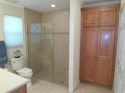 There's a large glass-walled shower